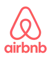 The image displays the Airbnb logo, featuring a red stylized "A" above the word "airbnb" in lowercase letters, symbolizing both individuality and connection—much like how effective Airbnb management ensures seamless guest experiences.