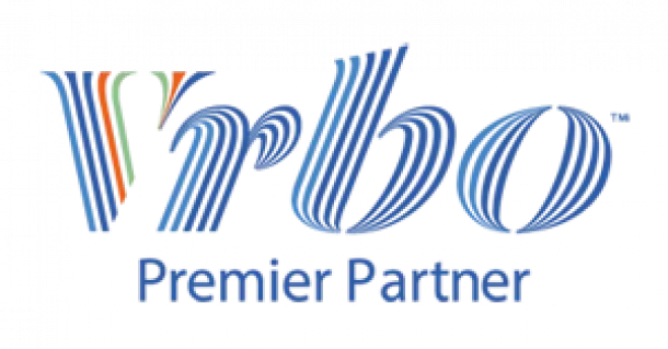 The image showcases the Vrbo Premier Partner logo in blue text set against a sleek black background, subtly evoking the professional touch of a short-term rental agency.